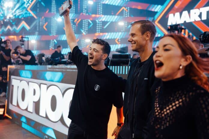 Martin Garrix on stage with performers