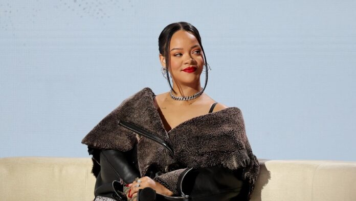 Rihanna wearing fur-trimmed clothing