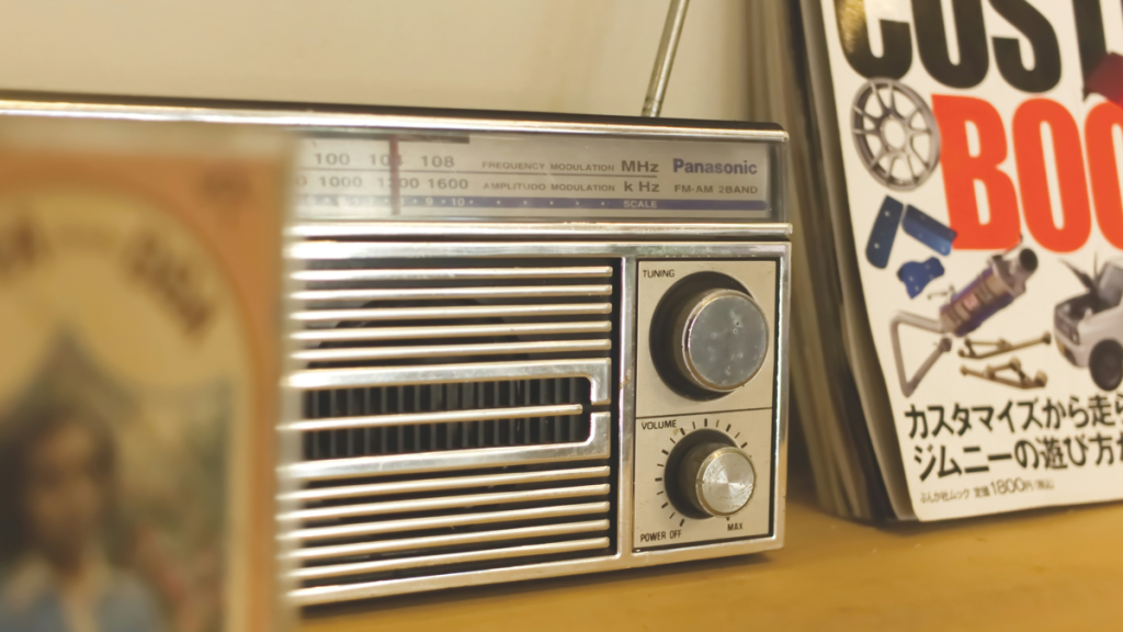 Vintage Panasonic radio on wooden surface