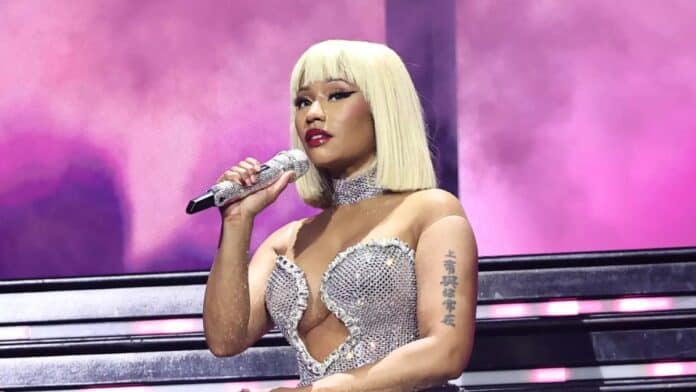 Nicki Minaj performs in pink outfit