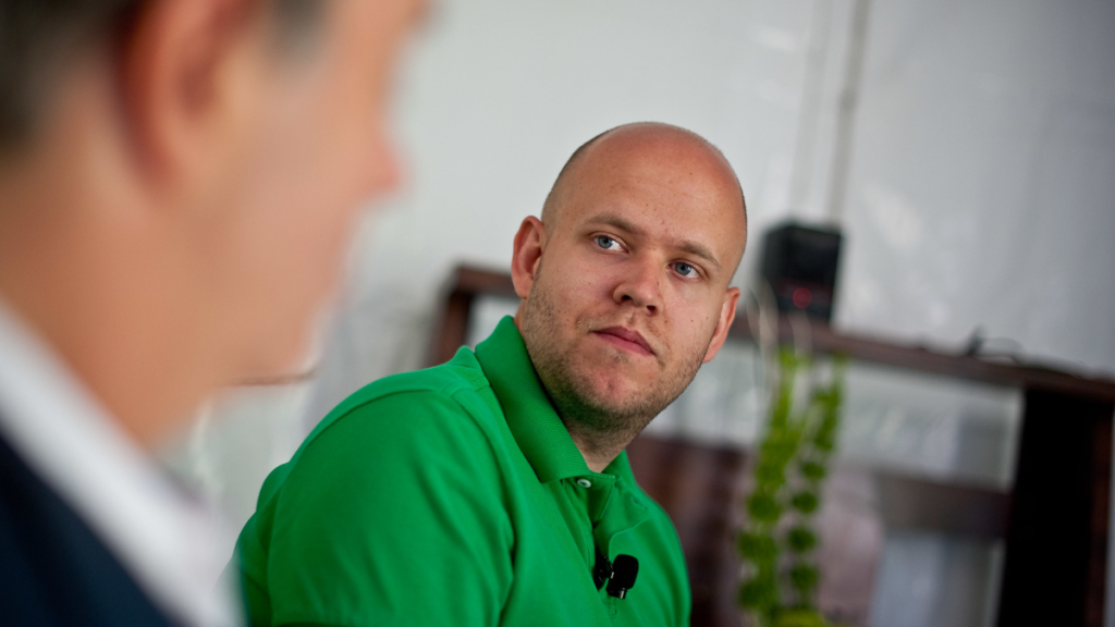 Man at Spotify office in green