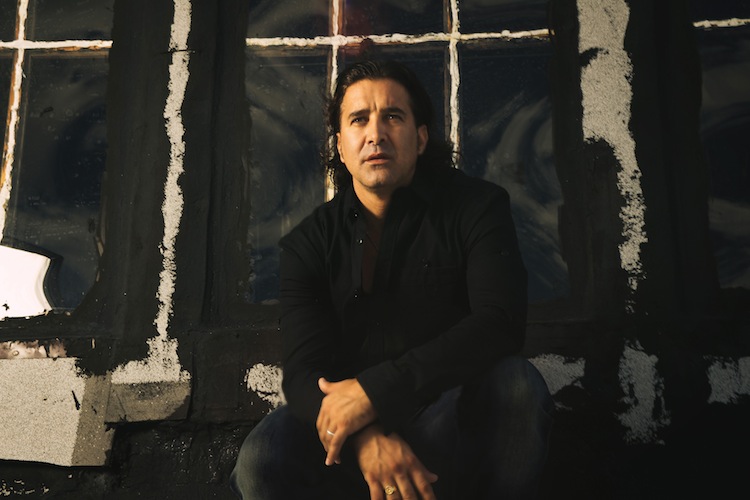 Scott Stapp looking through window