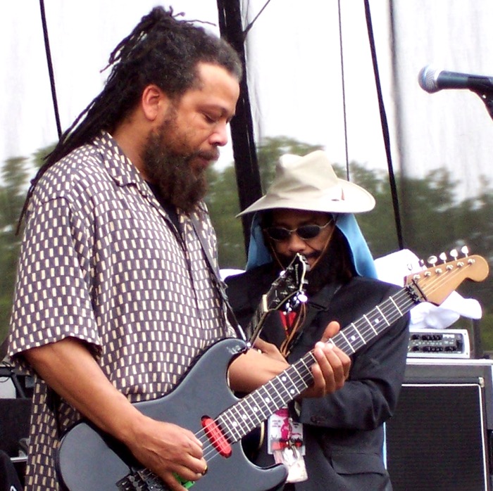 Two punk guitarists performing live