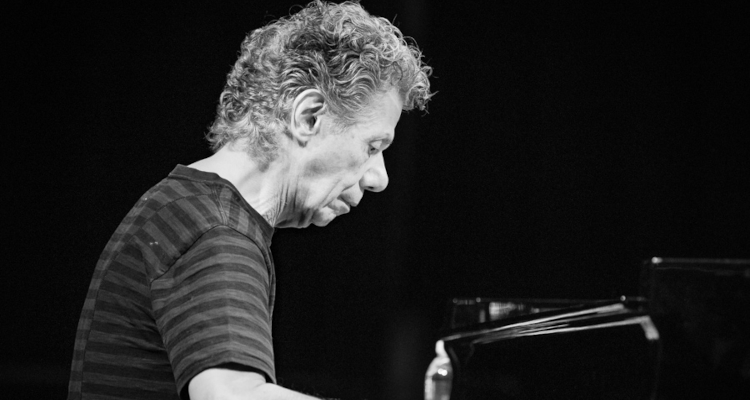 Chick Corea playing piano, black-and-white