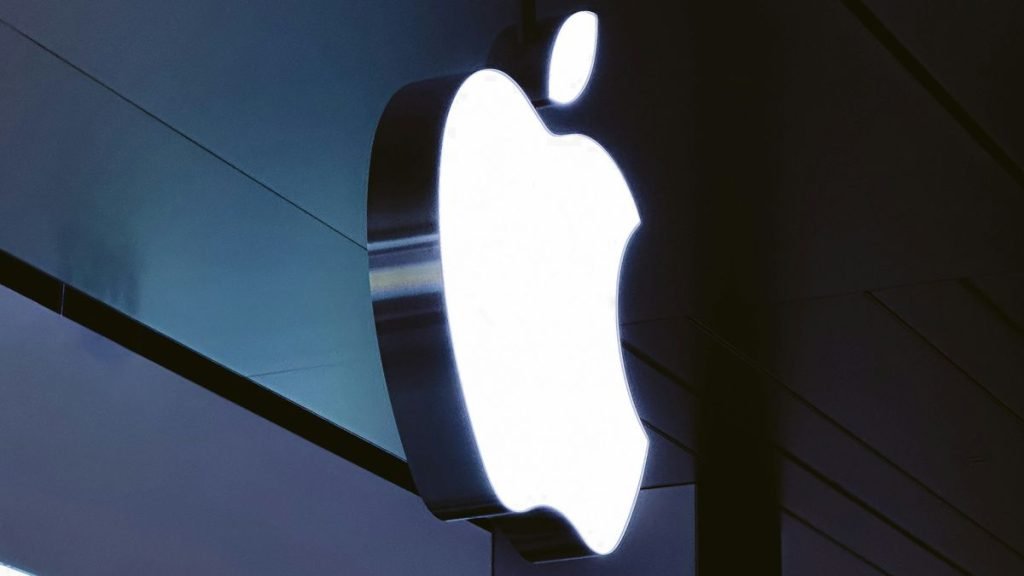 Apple logo on glass building exterior