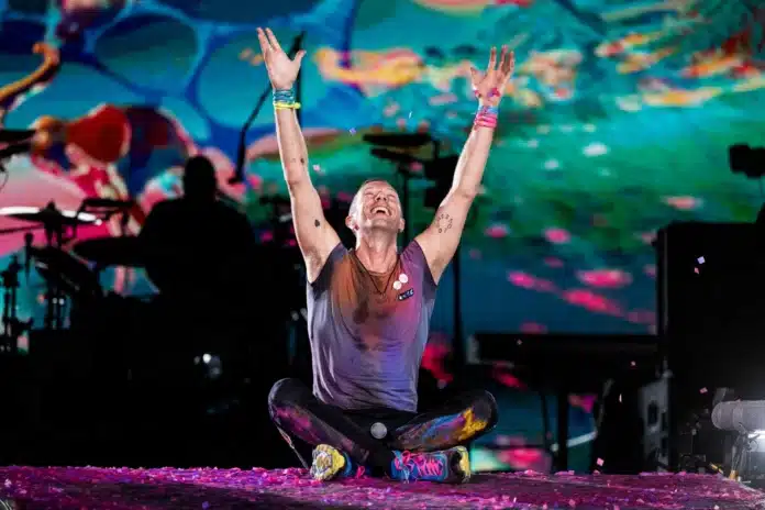 Chris Martin performing at Coldplay concert