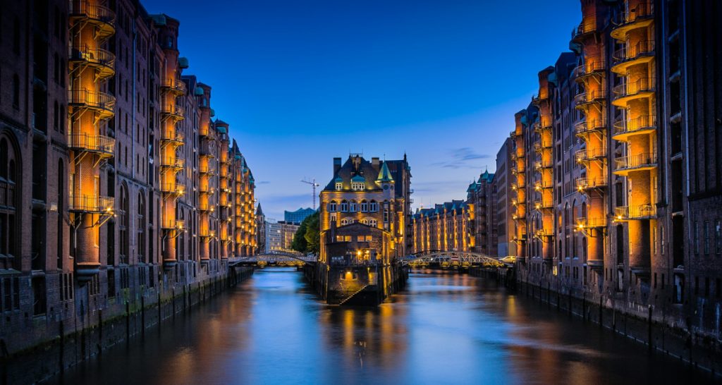 Hamburg canal illuminated at night