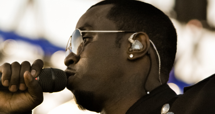 Diddy speaking into microphone