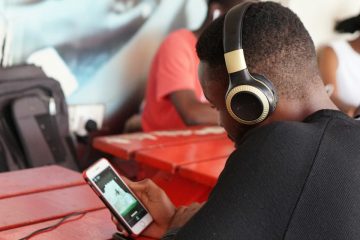 Man streaming music with headphones