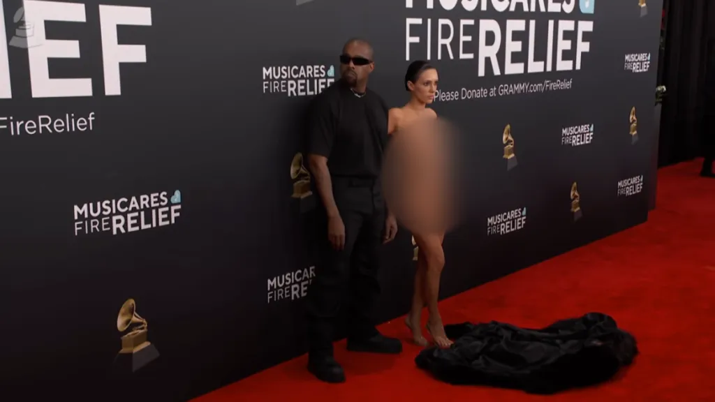 Kanye West and Bianca Censori standing