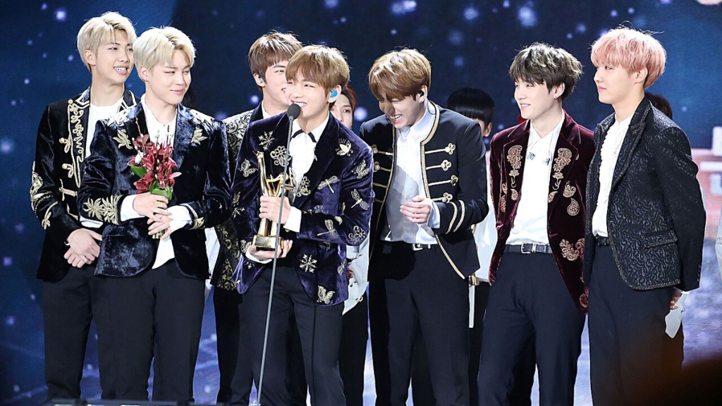 BTS members performing on stage