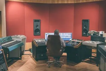 Man recording music in studio